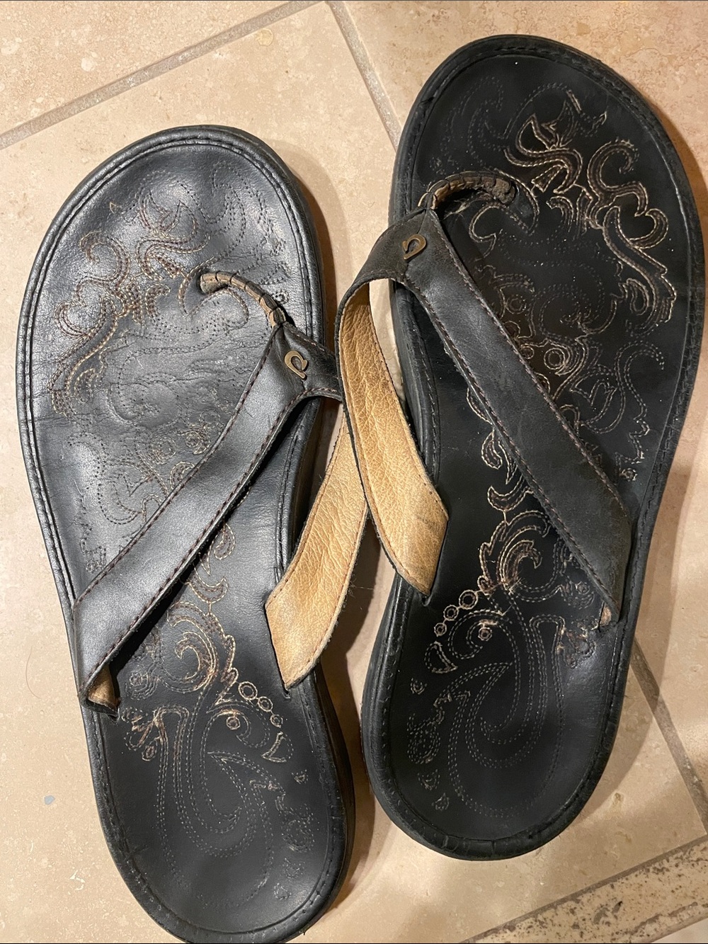 OluKai Black and Tan Women's Leather Flip Flop Sandals